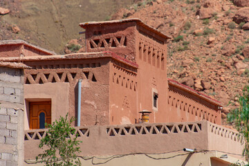 Moroccan architecture along a country road crisscrossing the country