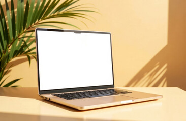 Fototapeta premium mockup of a brown case laptop display standing on a brown table next to a palm tree branch