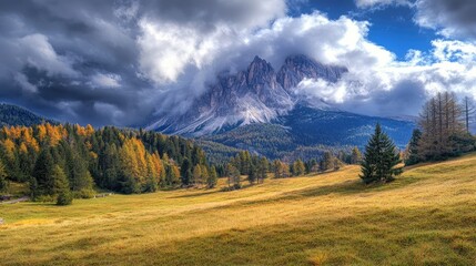 Majestic mountain landscape under a dramatic cloudy sky with vibrant autumn foliage in a serene natural setting.