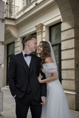 A beautiful Romantic Wedding Moment has been elegantly captured in a charming urban setting