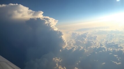 Fototapeta premium Dramatic cloud formations under bright daylight showcasing the beauty of atmospheric textures and colors from an aerial perspective