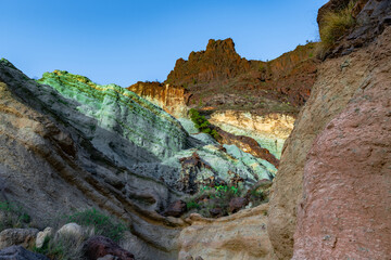 Azulejos de Veneguera or Rainbow Rocks Natural Monument in Mogan, Gran Canaria