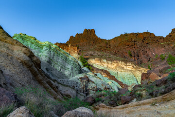 Azulejos de Veneguera or Rainbow Rocks Natural Monument in Mogan, Gran Canaria
