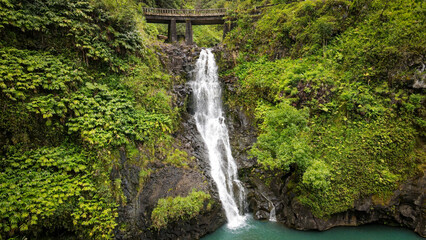 Top view to one of the many waterfalls of the Hawaiian Maui nature area close to the road to Hana