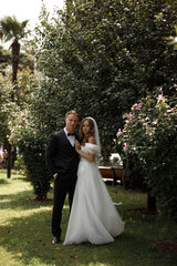 Beautiful and Elegant Wedding Ceremony in a Stunning Lush Garden Setting Outdoors