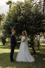 Beautiful and Elegant Wedding Ceremony in a Stunning Lush Garden Setting Outdoors