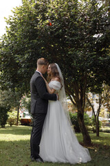 Beautiful and Elegant Wedding Ceremony in a Stunning Lush Garden Setting Outdoors