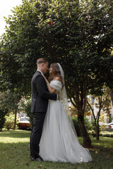 Beautiful and Elegant Wedding Ceremony in a Stunning Lush Garden Setting Outdoors