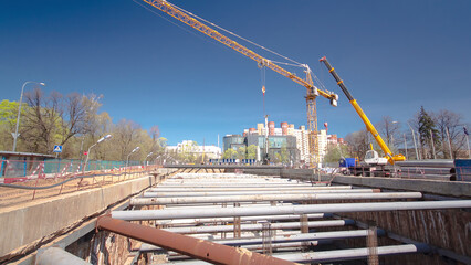 A large huge ditch pit tunnel timelapse hyperlapse at the construction site of the underground...