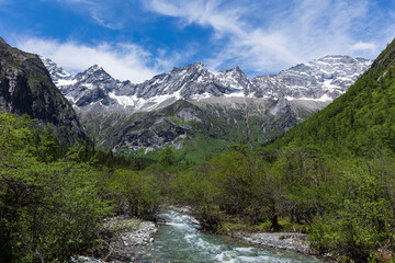 Shuangqiaogou stream and Siguniang Snow Mountain in Aba, Sichuan Province, China