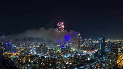 Naklejka premium Dubai Burj Khalifa New Year fireworks celebration timelapse and the Fire accident at Dubai, UAE.