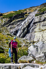 woman is hiking around T&eacute;ryho chate, high tatra, slovakia