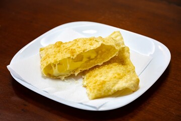 Traditional Brazilian fried cheese pastry known as pastel de feira