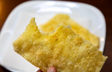 Traditional Brazilian fried cheese pastry known as pastel de feira