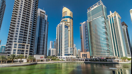 Obraz premium Residential buildings in Jumeirah Lake Towers timelapse hyperlapse in Dubai, UAE.