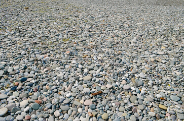 pebbles on the beach, Lots of rubble Pebble coast. Background from pebbles.