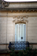 Old window with balcony