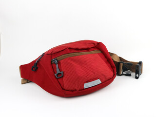 Bright sports burgundy waist bag on a white background.