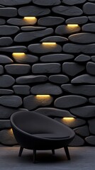 Obraz premium A modern black chair against a textured stone wall with soft glowing lights.