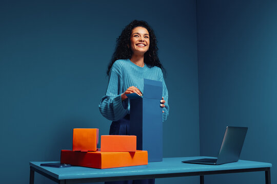 Small business owner preparing products for delivery