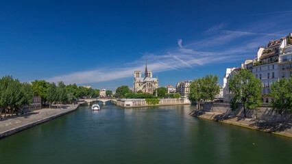 Obraz premium Seine and Notre Dame de Paris timelapse hyperlapse is the one of the most famous symbols of Paris