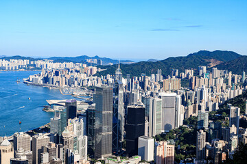 Fototapeta premium Spectacular View of Hong Kong Skyline with Iconic Skyscrapers and Victoria Harbour