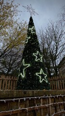 Decorative Christmas Tree with Lights in English Town Square