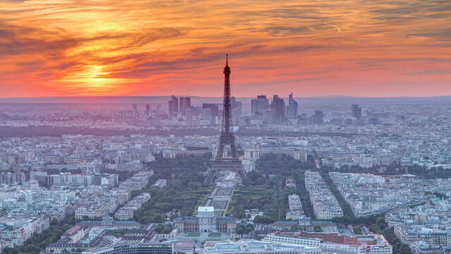 Panorama of Paris at sunset timelapse. Eiffel tower view from montparnasse building in Paris - France