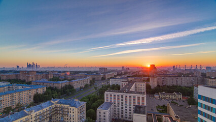 Obraz premium Residential buildings, Stalin skyscrapers and panorama of city at sunrise timelapse in Moscow, Russia