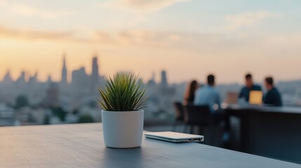 A modern workspace featuring a plant and city skyline, ideal for showcasing professionalism and creativity in business.
