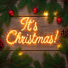 Festive neon sign reading Its Christmas with pine branches, red berries, and pinecones on a wooden surface