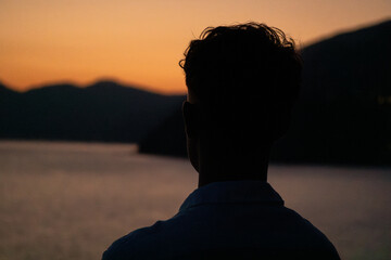 silhouette of a person in the sun