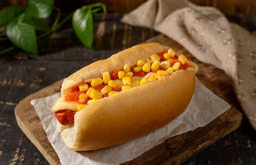 hot dog on rustic set background.