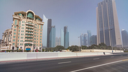 Fototapeta premium Dubai financial centre with skyscrapers timelapse hyperlapse