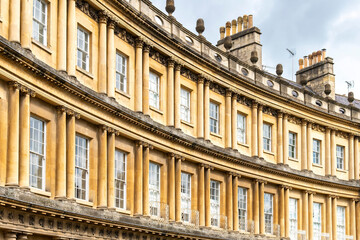 Part of the façade of historic ring of townhouses on The Circus in Bath, Somerset, UK designed by...