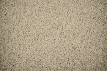 antiquewhite color rough textured background with copy space, background for wallpaper, minimal flat lay.