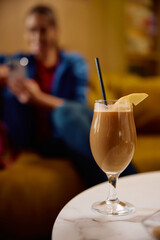 Close up of protein shake in glass.