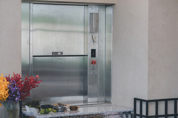 Dumbwaiter Lift elevator in a kitchen of Restaurant or Hotel used for carrying food or goods. Food hoist and food elevator for ready meals. Small Freight Elevators or Dumbwaiters Food Elevators