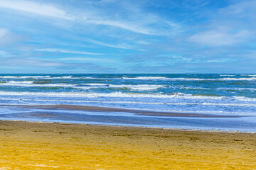 Sea water of the Caspian Sea. Sea waves on the sea coast, vacation, recreation. Republic of Dagestan, Derbent.