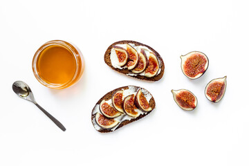 Fig sandwiches with cheese and honey for breakfast. Top view