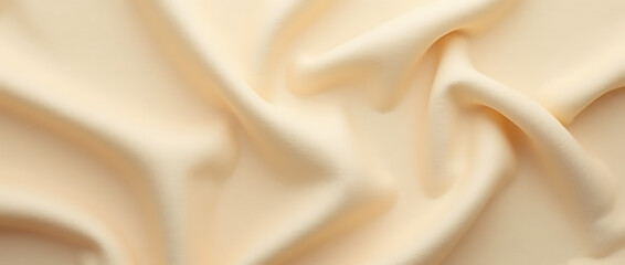 Obraz premium A luxurious golden silk satin fabric with smooth texture and elegant pattern flowing in soft waves, creating a shiny and decorative backdrop for a fashionable and sophisticated design