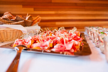 Elegant Buffet Presentation of Gourmet Finger Foods With Fresh Bread and Small Appetizers
