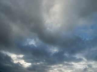 The sky is cloudy and grey. The clouds are low and heavy, and the sky is overcast