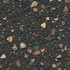 Close-up of asphalt texture with small colorful stones.