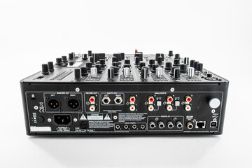 Rear View of Professional Audio Mixer with Cable Connections and Control Knobs for Professional...