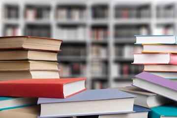 stack of old reading books on background