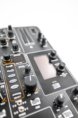Close-Up of Professional DJ Mixer Controls with Focus on Knobs and Screen