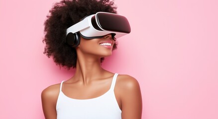 Portrait of a beautiful woman wearing a virtual reality headset and doing yoga on a pink background.