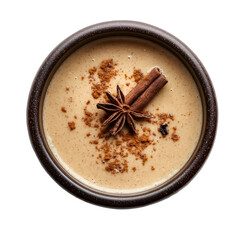 Extreme top view of hyperrealistic chai spiced pudding in a dark bowl isolated on a white transparent background