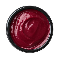 Extreme top view of hyperrealistic red velvet pudding in a dark ramekin isolated on a white transparent background